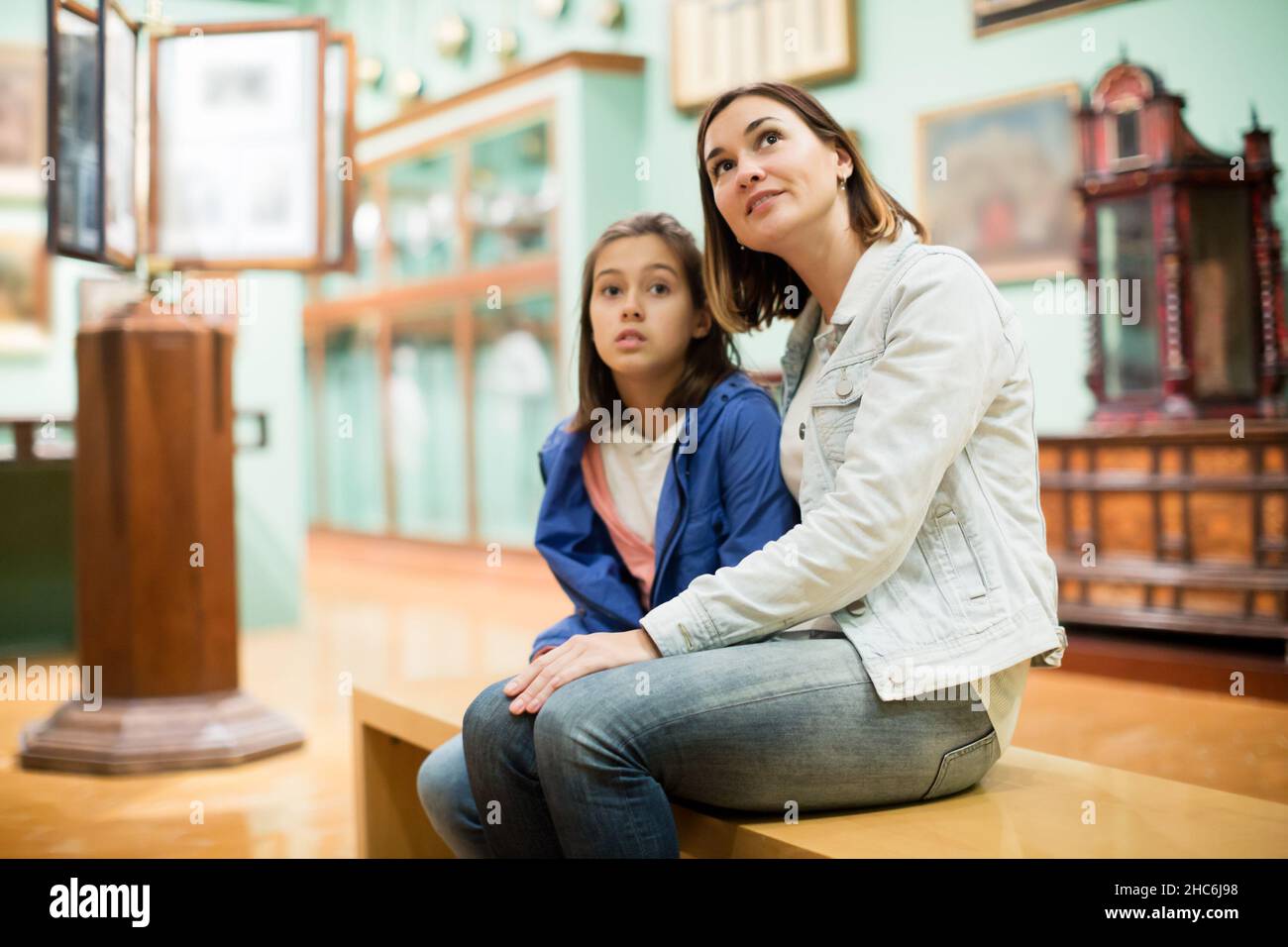 Mother and daughter exploring expositions Stock Photo