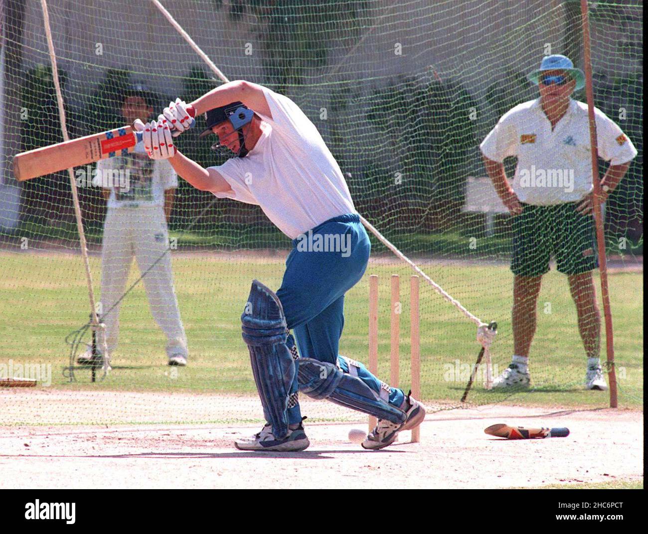 File photo dated 28-02-1996 of England Cricket Captain Mike Atherton being watched by manager Ray Illingworth at net practice in Karachi. Former cricketer Ray Illingworth has died at the age of 89, Yorkshire have announced. Illingworth, who led England to a Test series victory over Australia Down Under in 1970-71, had been undergoing radiotherapy for esophageal cancer. Issue date: Saturday December 25, 2021. Stock Photo