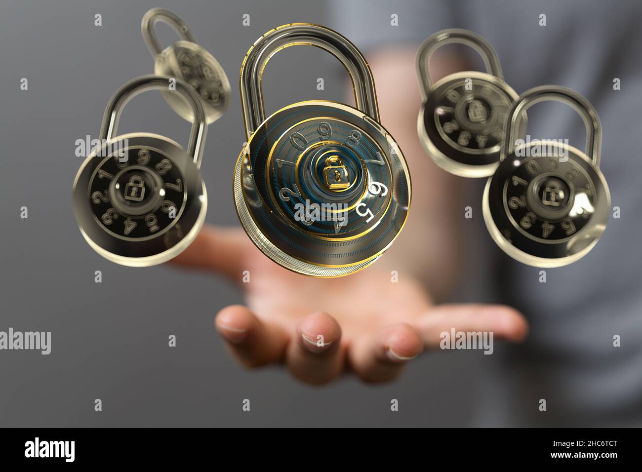 Male's hand holding illustrated padlocks - security concepts Stock Photo