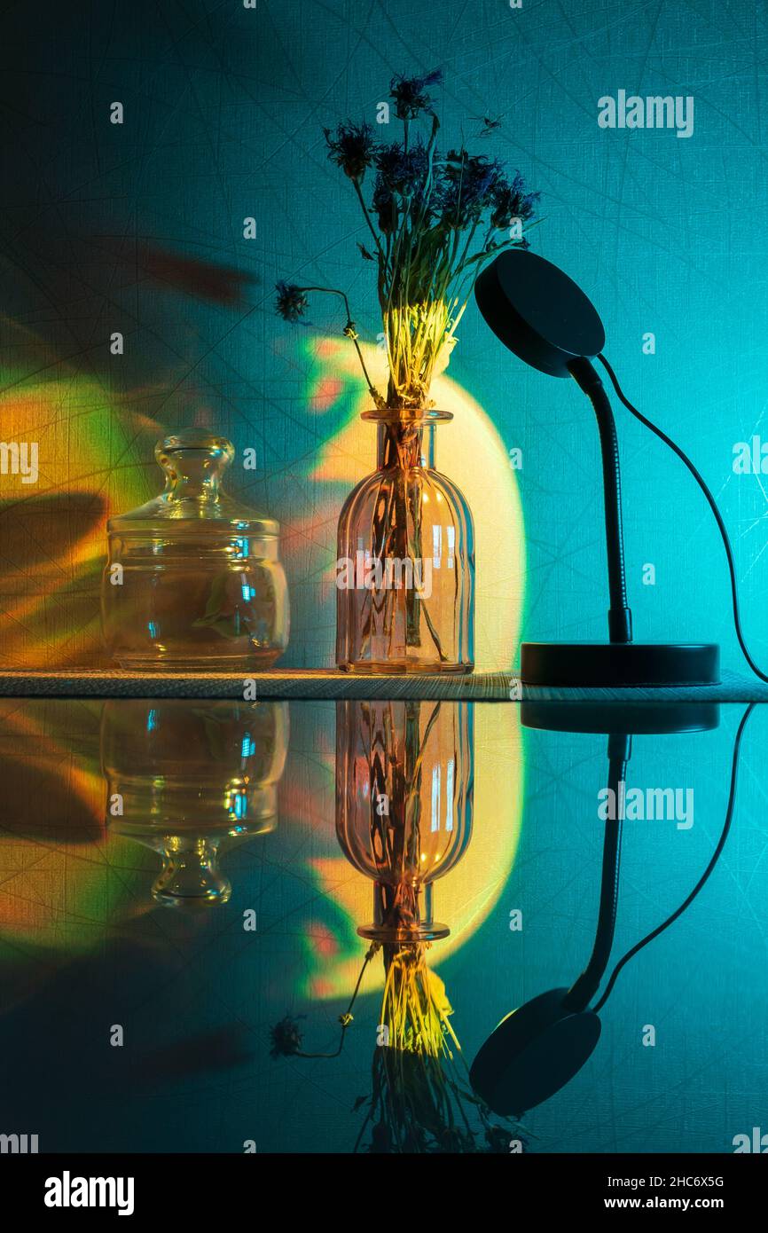 Sunset projector lamp close up. Multi colored RGB light. Home decor. Selective focus Stock Photo