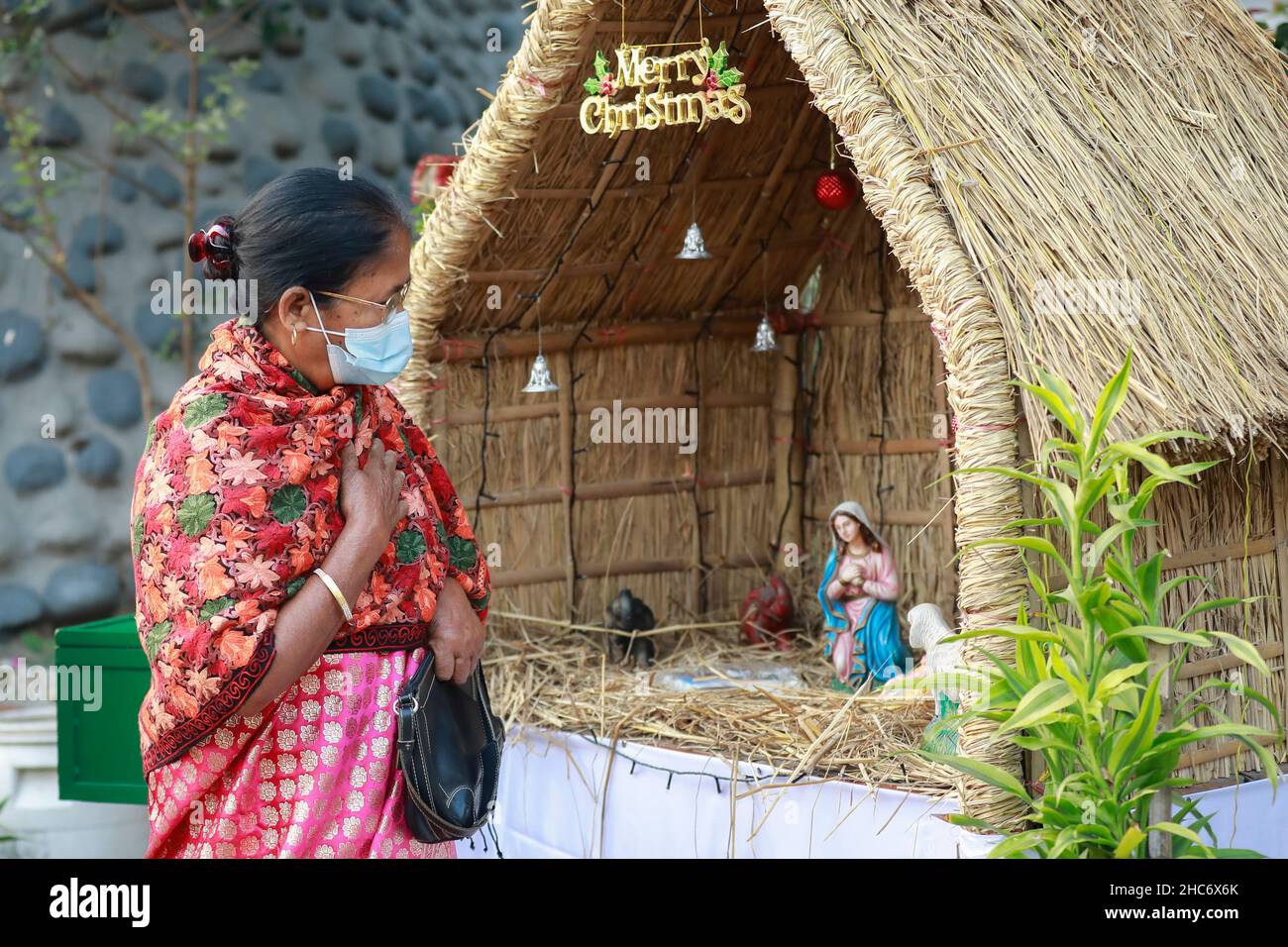 Bangladeshi Christian People offering prayer in Church during Christmas