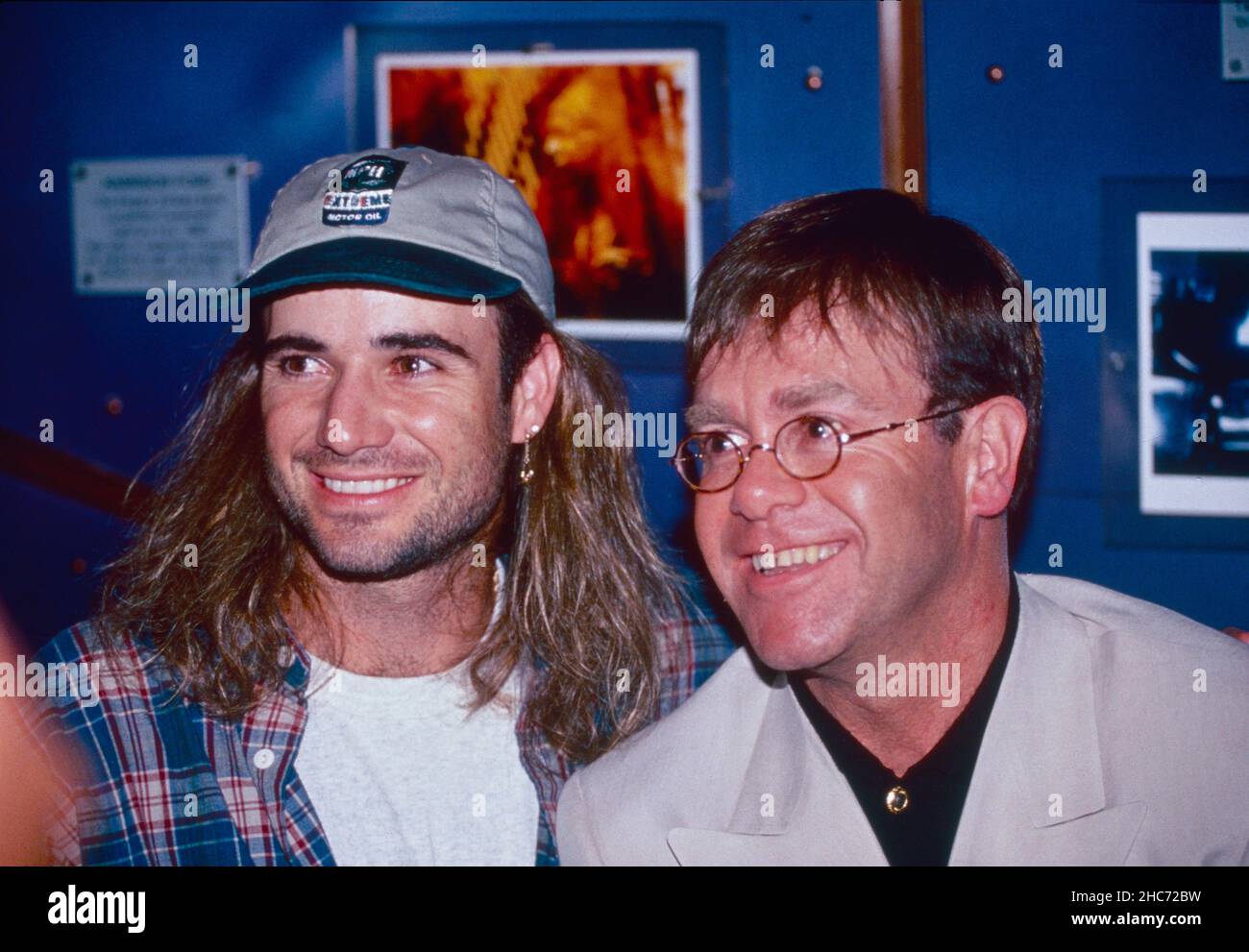 American tennis player Andre Agassi and English singer and songwriter Elton John, ATP Awards, Planet Hollywood 1994 Stock Photo