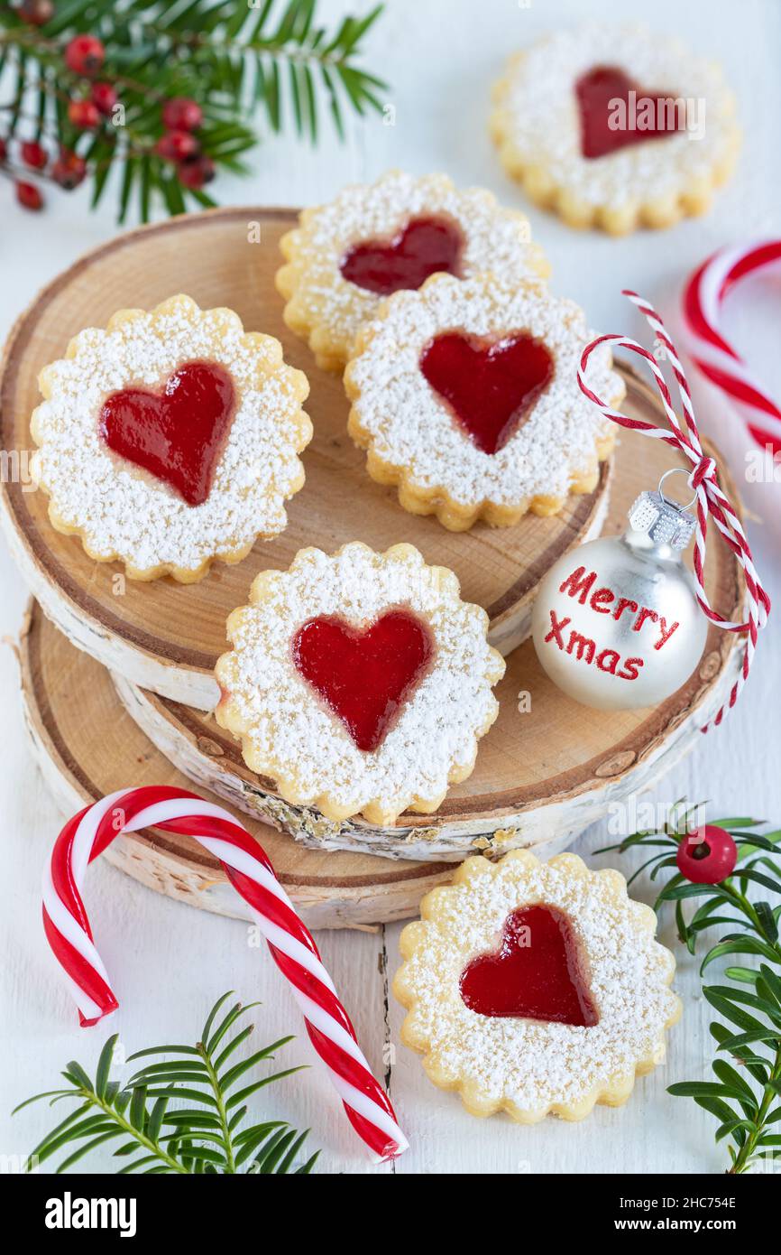 christmas bakery biscuits Spitzbuben on wooden disc Stock Photo - Alamy