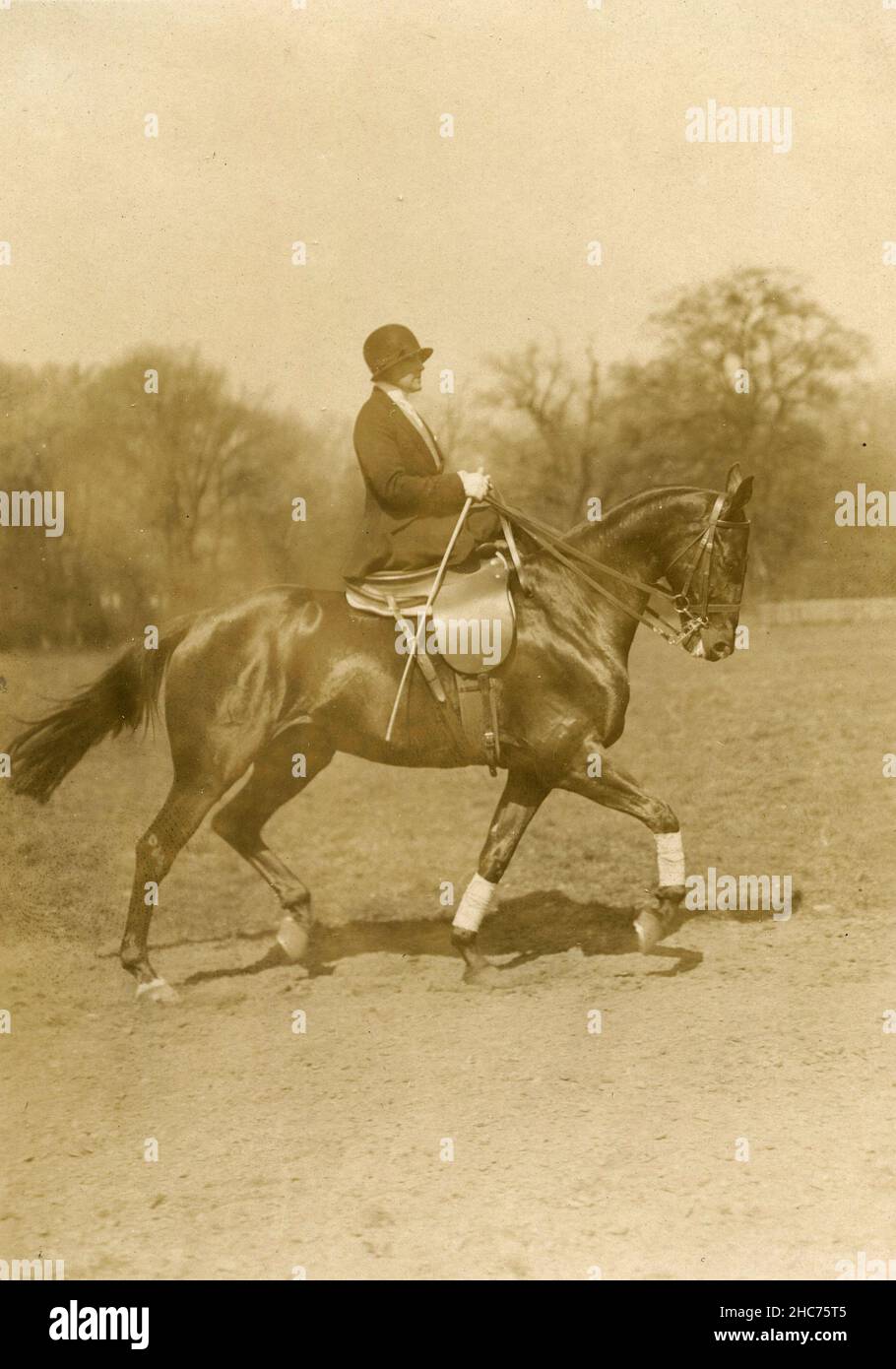 Woman riding a horse sidesaddle, Italy 1920s Stock Photo