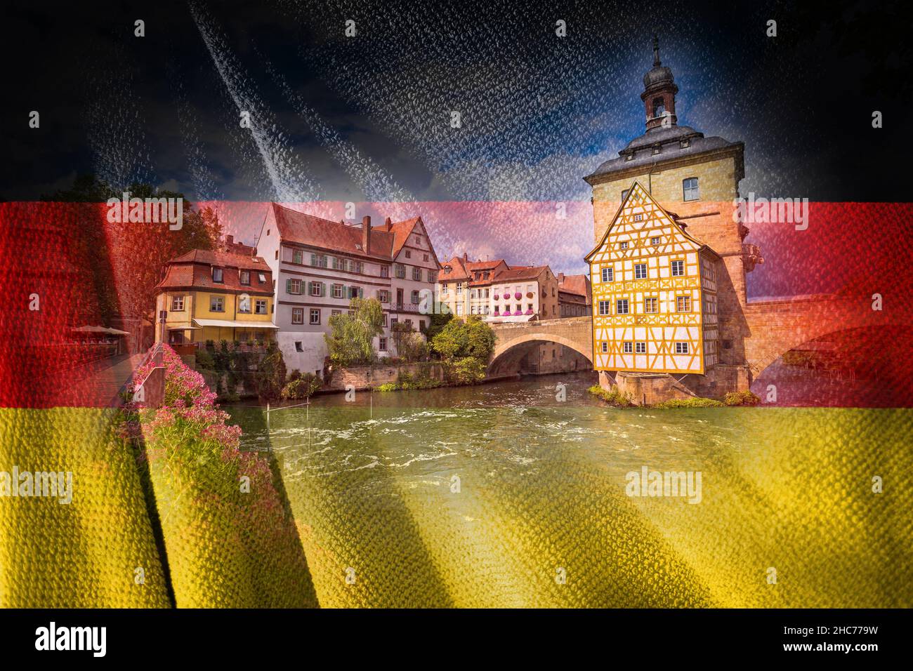 Bamberg. Scenic view of Old Town Hall of Bambergwith two bridges over the Regnitz river on German flag overlay, Bavaria region of Germany Stock Photo