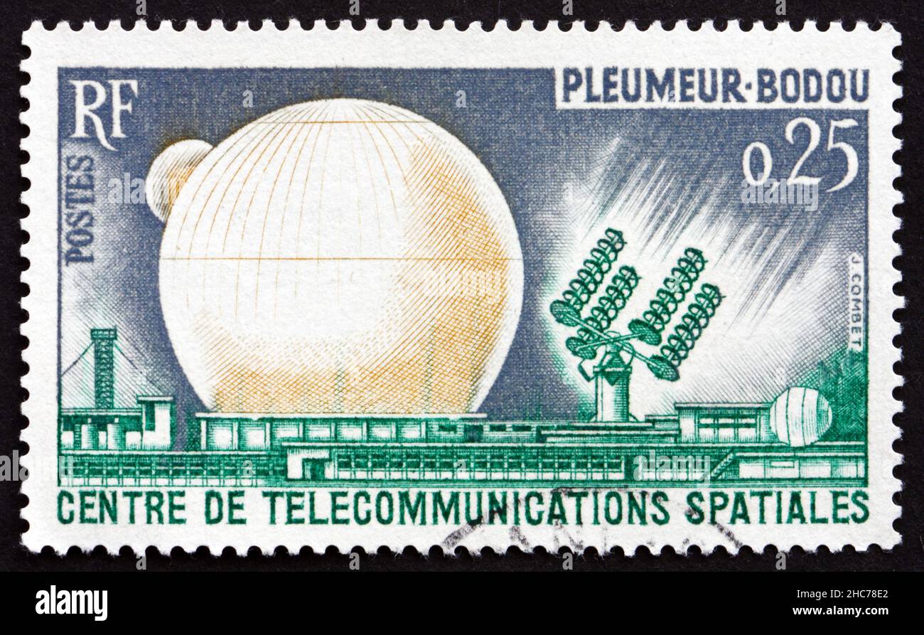 FRANCE - CIRCA 1962: a stamp printed in the France shows Space Communications Center, Pleumeur-Bodou, 1st Television Connection of the US and Europe t Stock Photo
