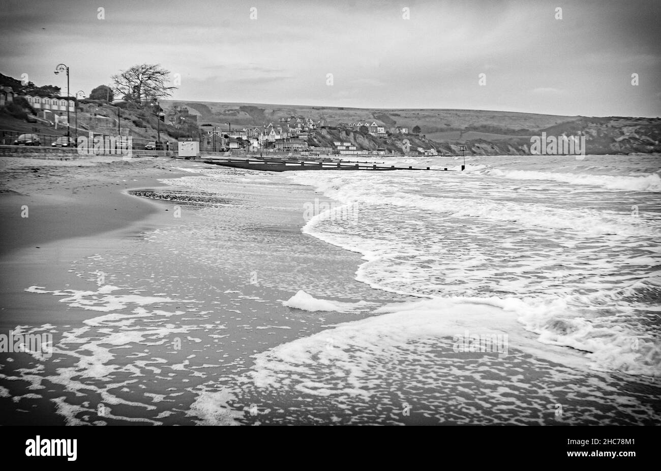 Black and white treated image of Swanage beachfront on a wet winter day, treated to look like an old postcard Stock Photo