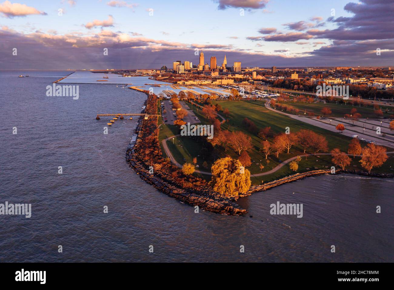 Aerial view of downtown Cleveland at sunset with the docks at Edgewater Park in front Stock Photo