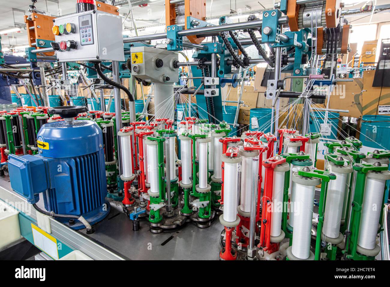 Machinery and equipment in a yarn manufacturing company. Textile industry. Spinning machine in a