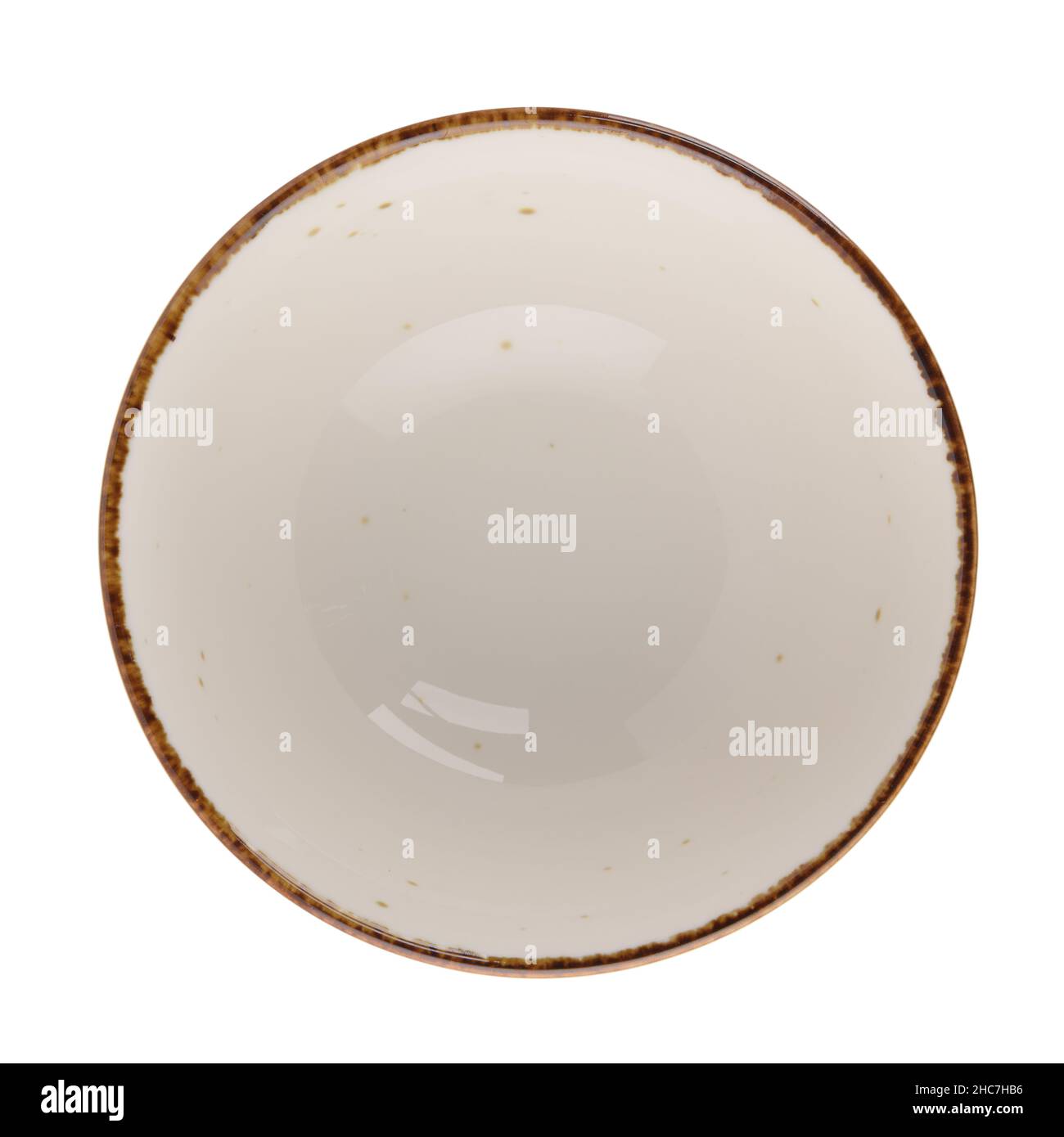 White round ceramic bowl on white reflective background. Stock Photo