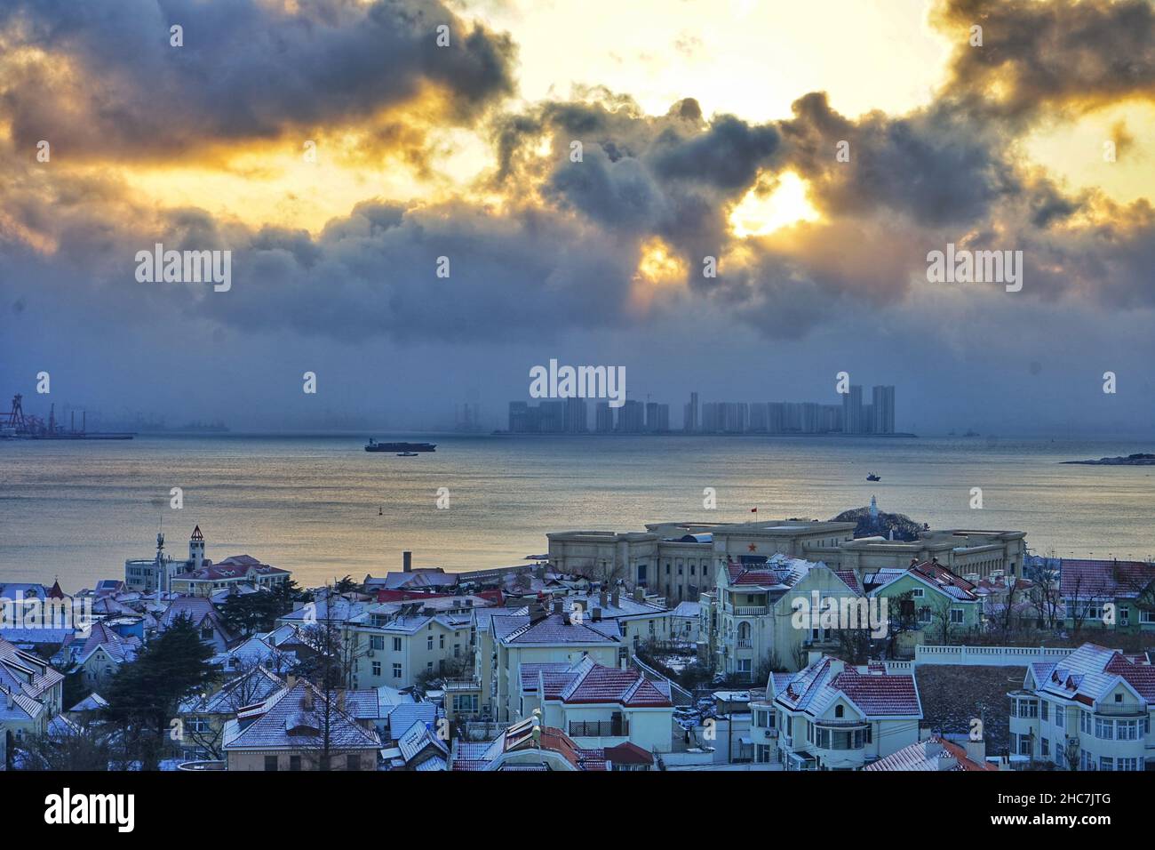 QINGDAO, CHINA - DECEMBER 25, 2021 - A view of xiaoyu Mountain, a classical architectural complex, is seen after snow on December 25, 2021 in Qingdao, Stock Photo