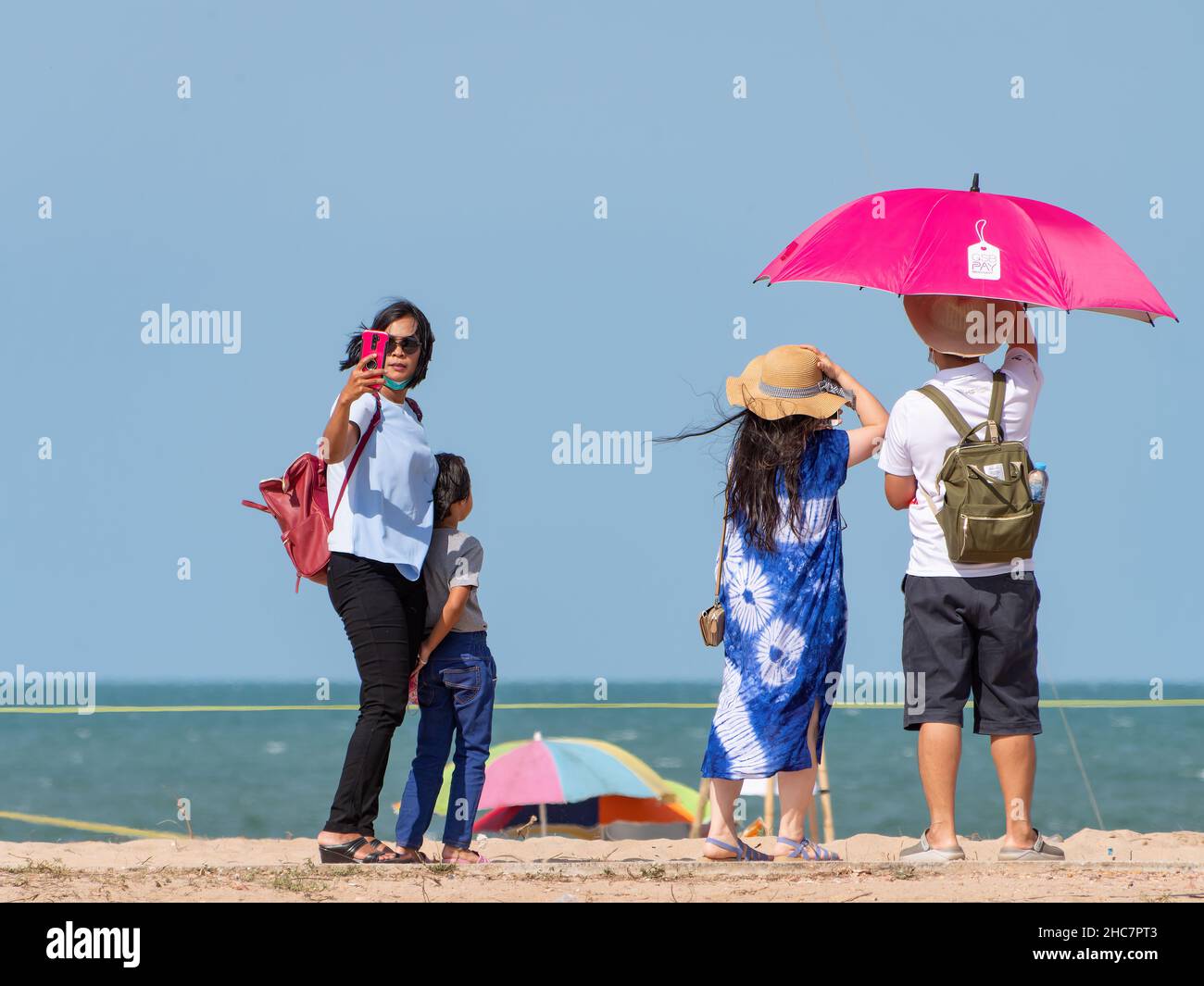 Visitors on the beach at Surat Thani Kite Festival 2021 in Surat Thani, Thailand. Stock Photo