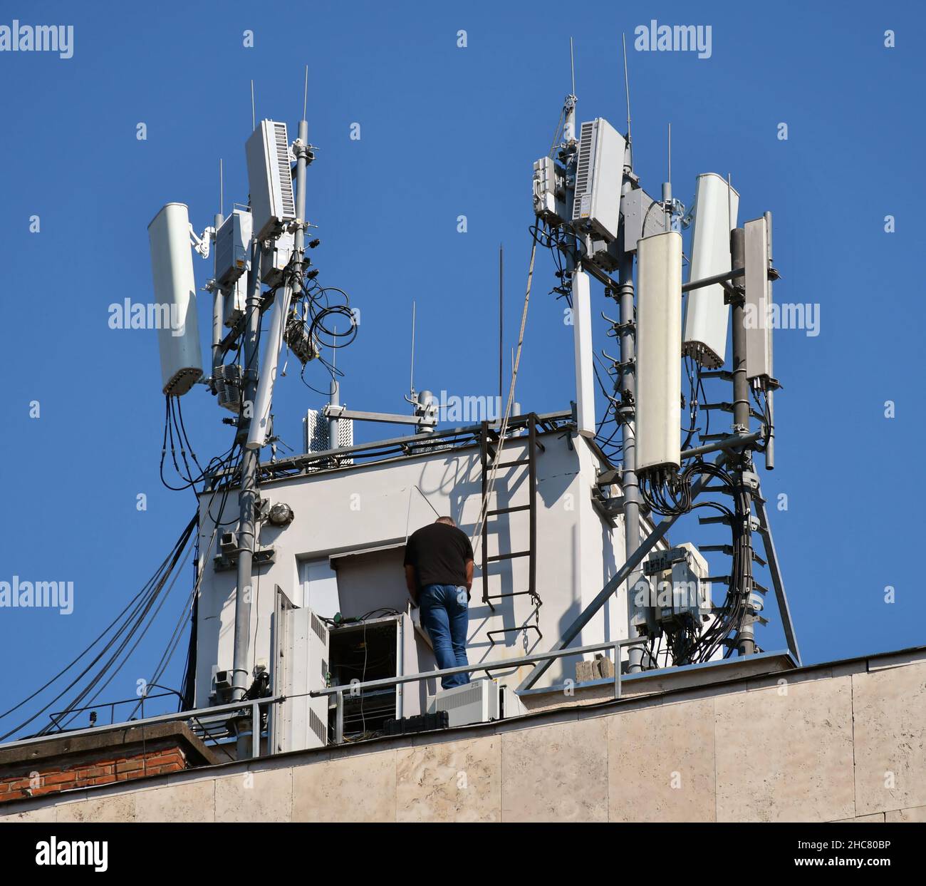 Residential building roof with antennas hi-res stock photography and ...