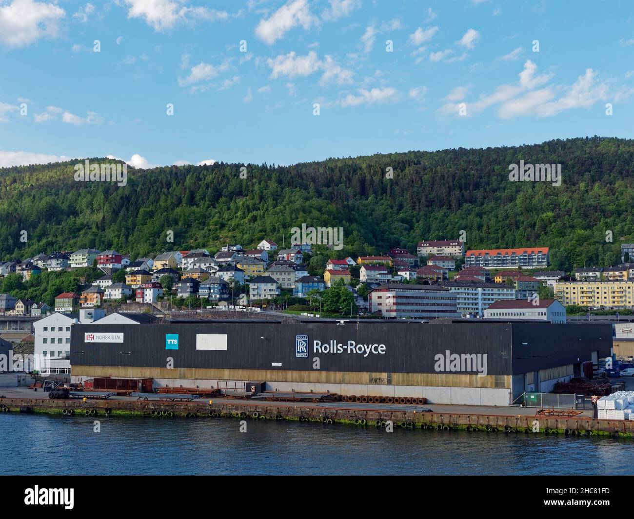 The Rolls Royce Factory and Warehouse in the Port of Bergen with a full Yard of Stores next to the Waterfront and Quay. Stock Photo