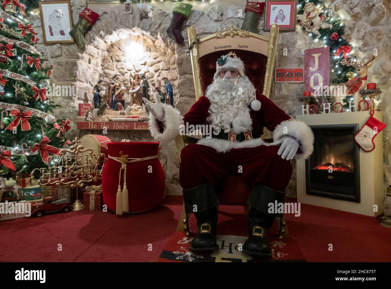 Issa Kassissieh an Arab Orthodox Christian and Israel’s only certified Santa Claus at his Santa's House in the Christian Quarter old city of Jerusalem Israel Stock Photo