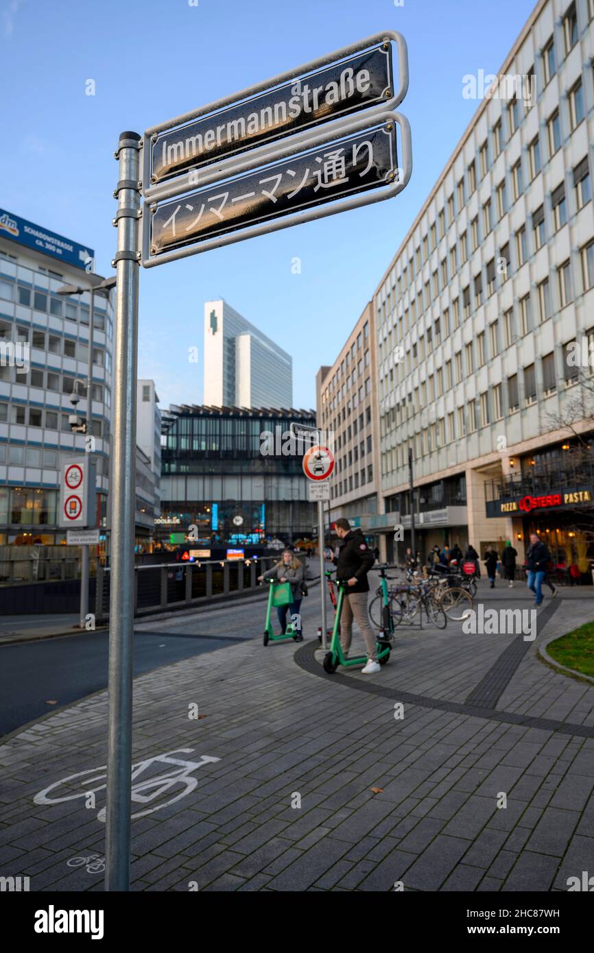 Duesseldorf, Germany, Dec. 11, 2021, Immermannstrasse is the main artery of Düsseldorf's 'Little Tokyo' japanese district and as such received an additional street sign in Japanese Stock Photo
