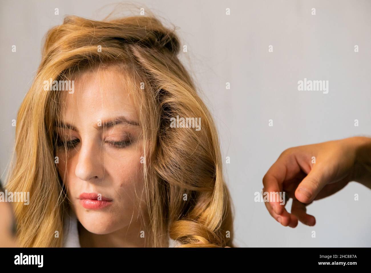 Cape Town, South Africa March 29, 2021 Hairstylist working with