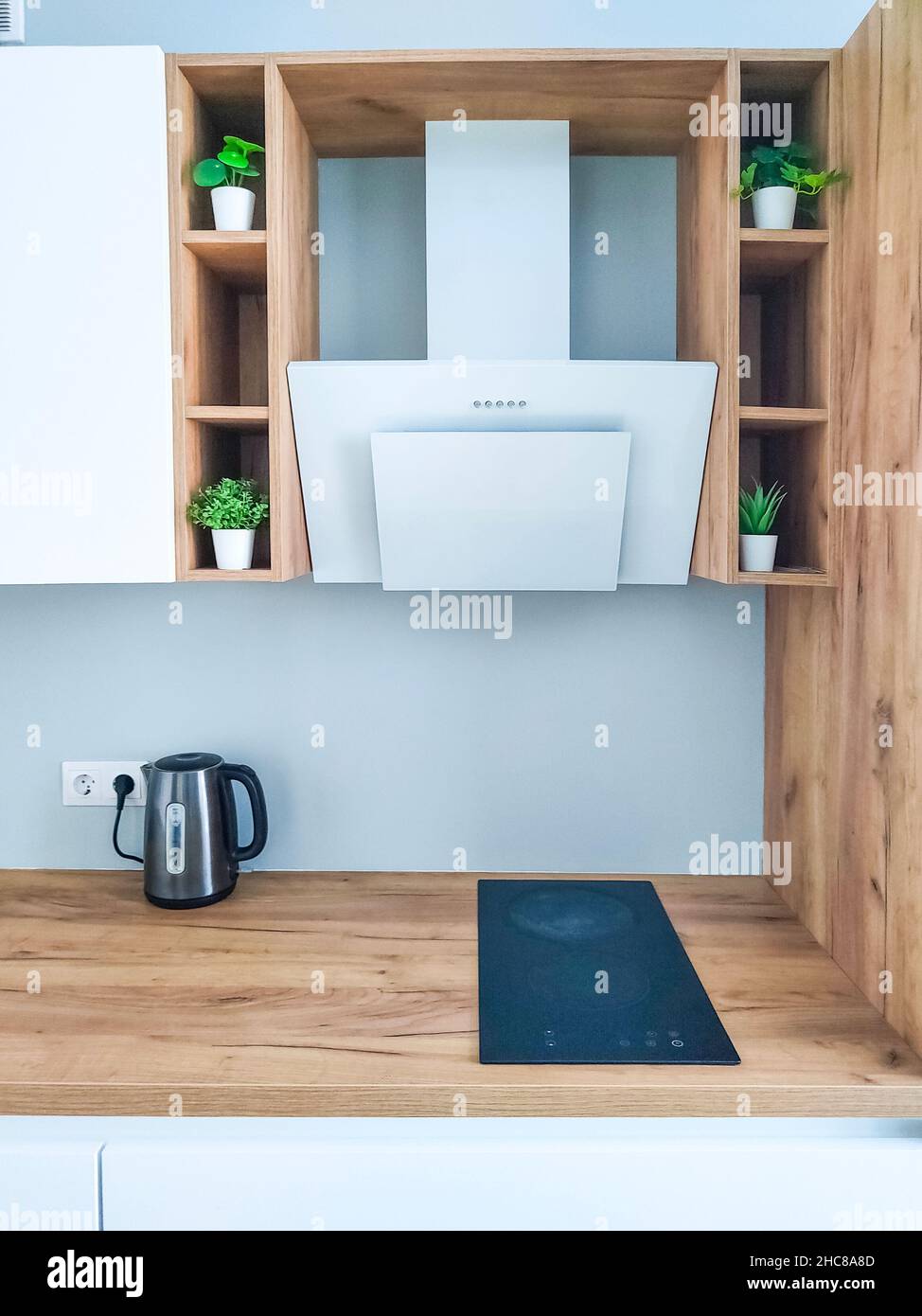 White cooker hood in kitchen Scandinavian interior Stock Photo