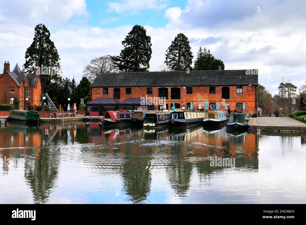 Narrowboats at the Grand Union Canal Basin, Market Harborough town, Leicestershire, England; UK Stock Photo