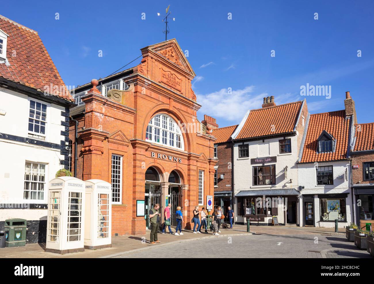Browns Beverley department store The grapes pub and white telephone boxes in the Market town of Beverley Yorkshire East Riding of Yorkshire England UK Stock Photo