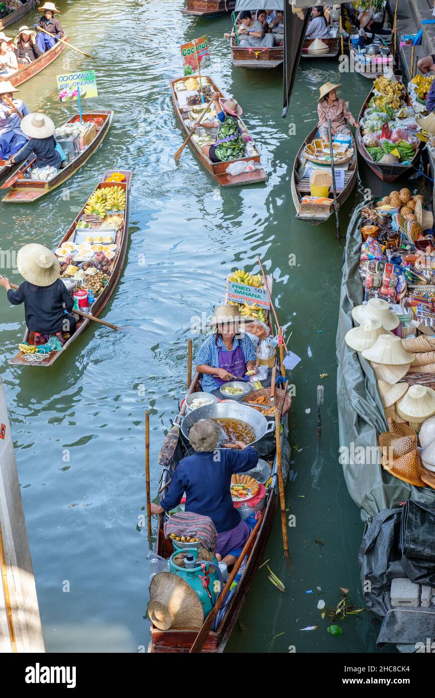 The Floating Market at Damnoen Saduak in Ratchaburi Province is the most famous floating market in Thailand. Stock Photo