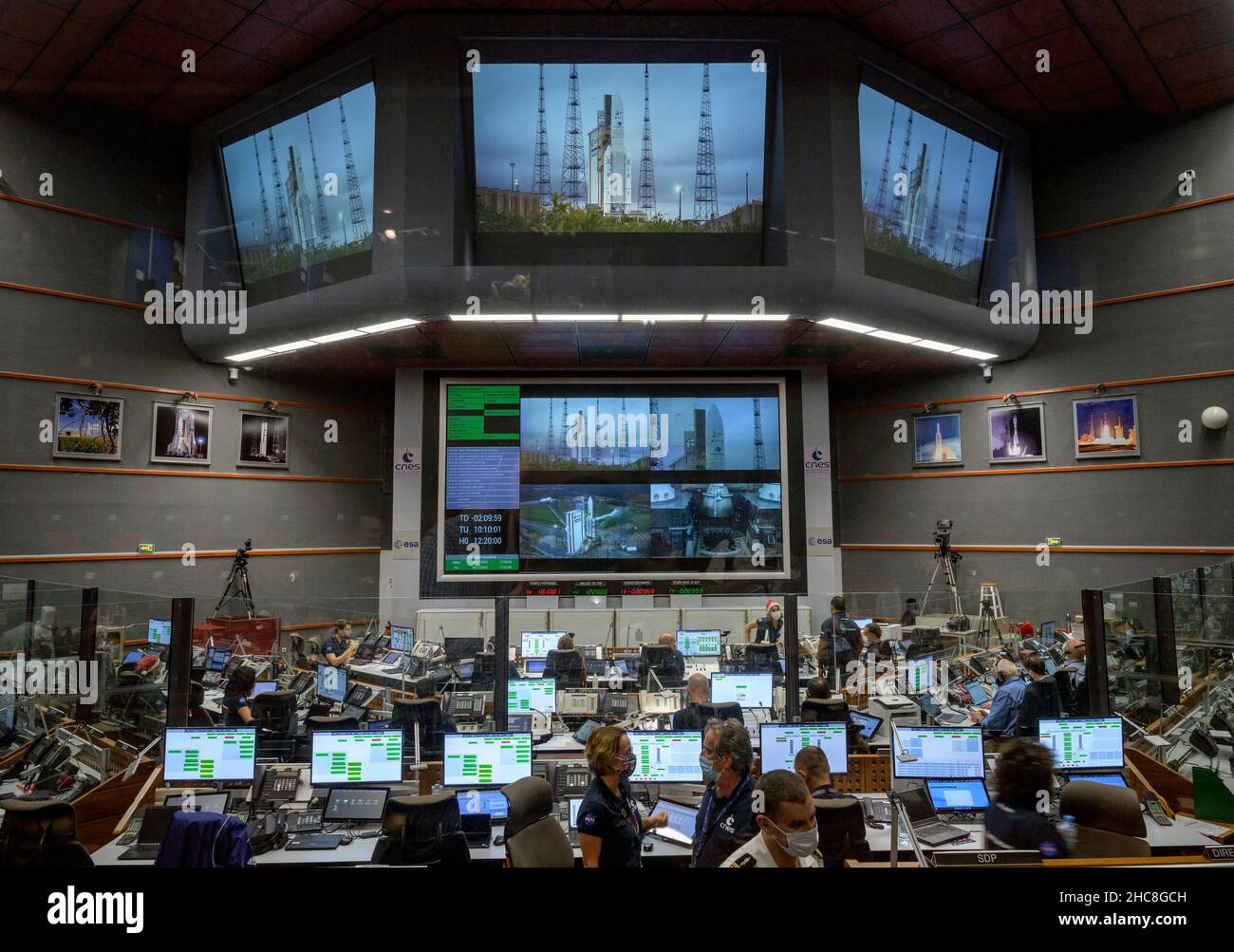 Launch teams monitor the countdown to the launch of Arianespace's Ariane 5 rocket carrying NASA's James Webb Space Telescope, Saturday, Dec. 25, 2021, in the Jupiter Center at the Guiana Space Center in Kourou, French Guiana. The James Webb Space Telescope (sometimes called JWST or Webb) is a large infrared telescope with a 21.3 foot (6.5 meter) primary mirror. The observatory will study every phase of cosmic history-from within our solar system to the most distant observable galaxies in the early universe.Mandatory Credit: Bill Ingalls/NASA via CNP /MediaPunch Stock Photo
