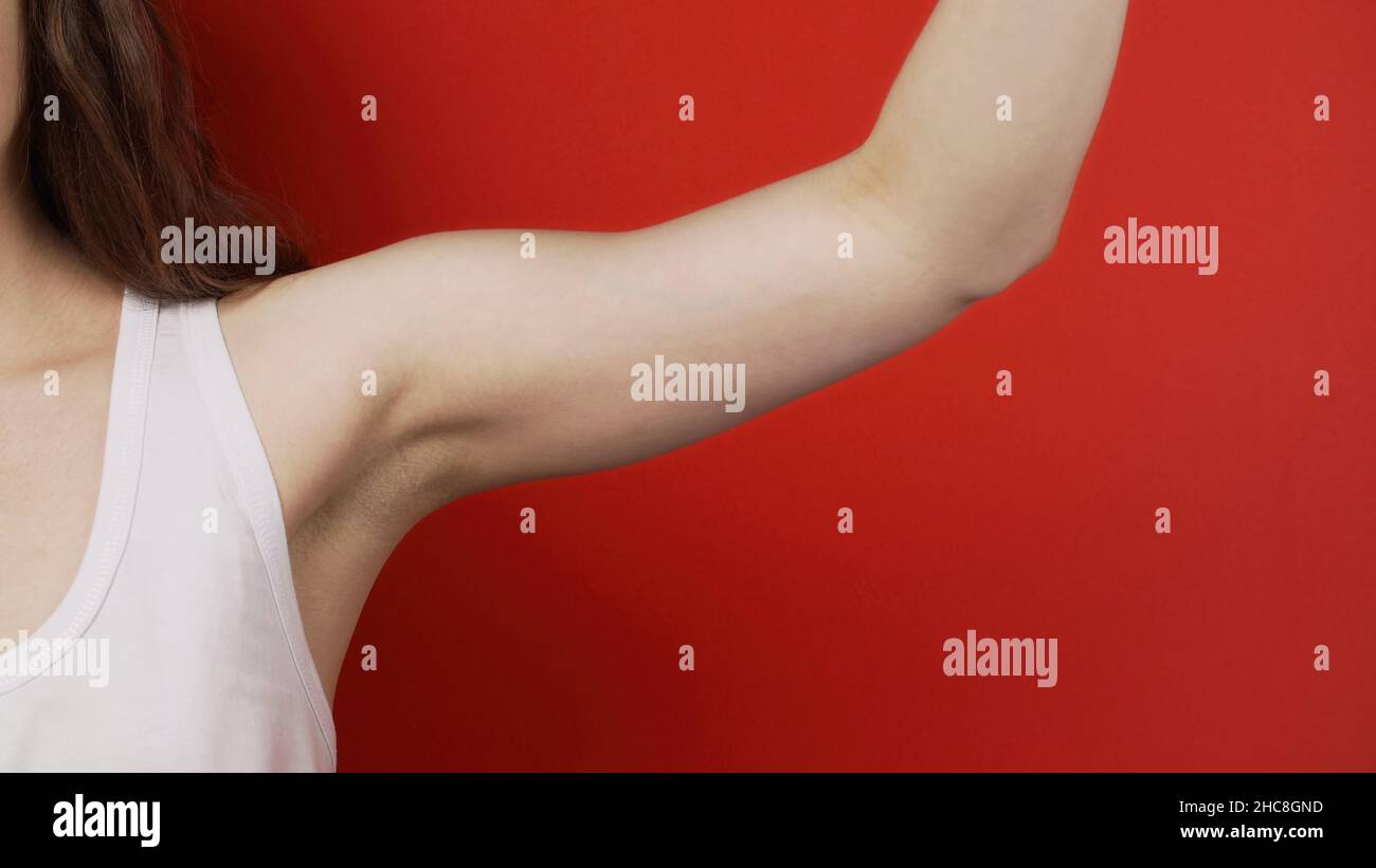 Photo of the woman showing the armpit Stock Photo