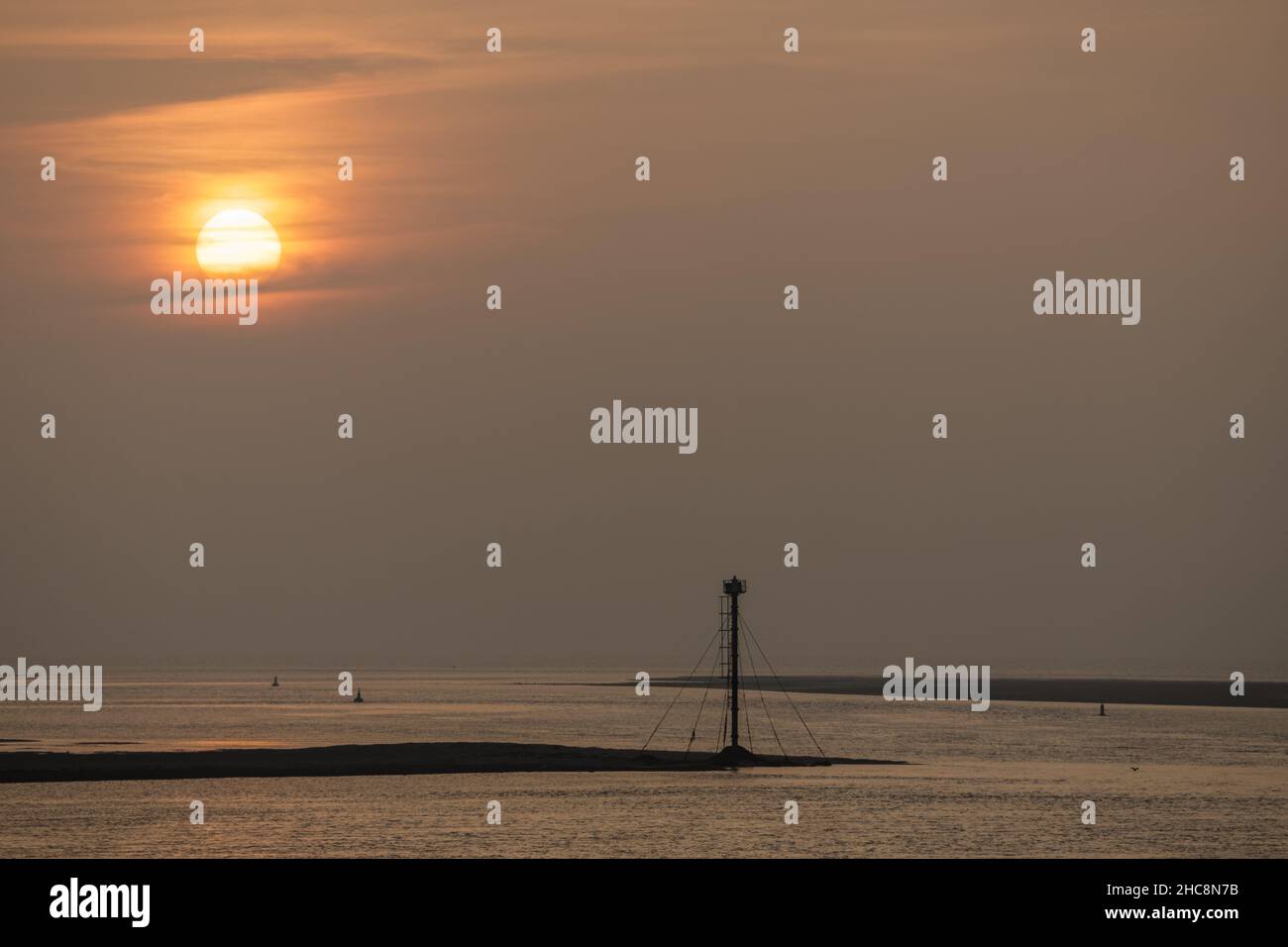 Sunset over the Irish Sea from Deganwy, North Wales coast Stock Photo