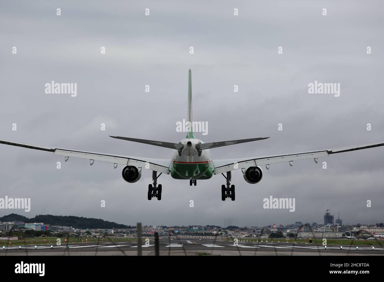 B-16335 EVA Airways Airbus A330-300 is landing to Taipei Songshan Airport (TSA). Stock Photo