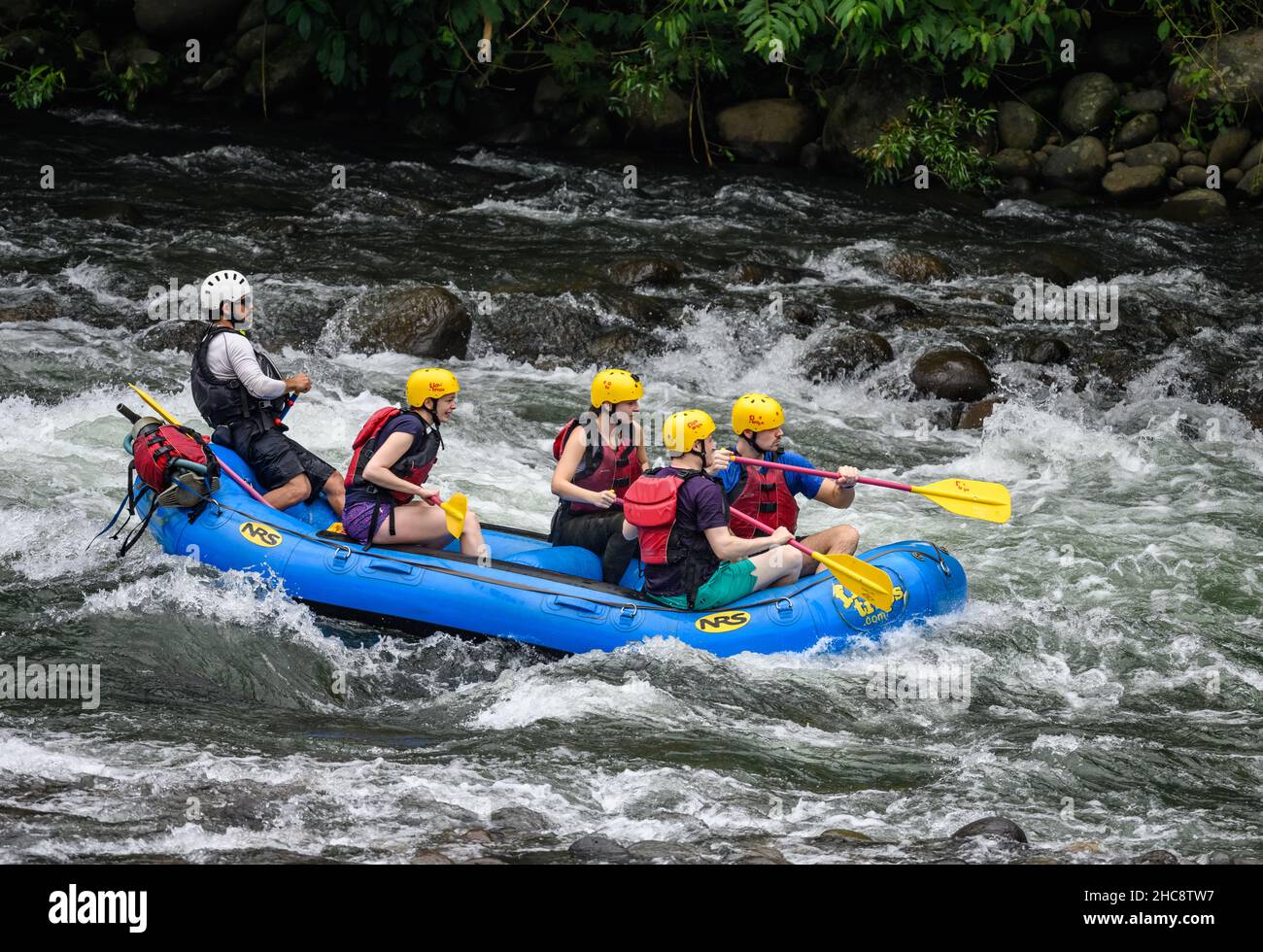 A group of tourists whitewater rafting in the Sarapiqui River. Heredia, Costa Rica. Stock Photo
