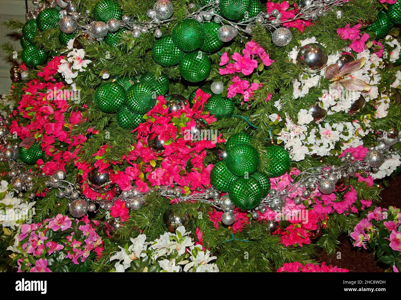 Christmas tree; close-up, decorated in flowers and balls; white; deep pink; green; silver, unique; colorful; festive; holiday; Winterthur Museum; Stock Photo