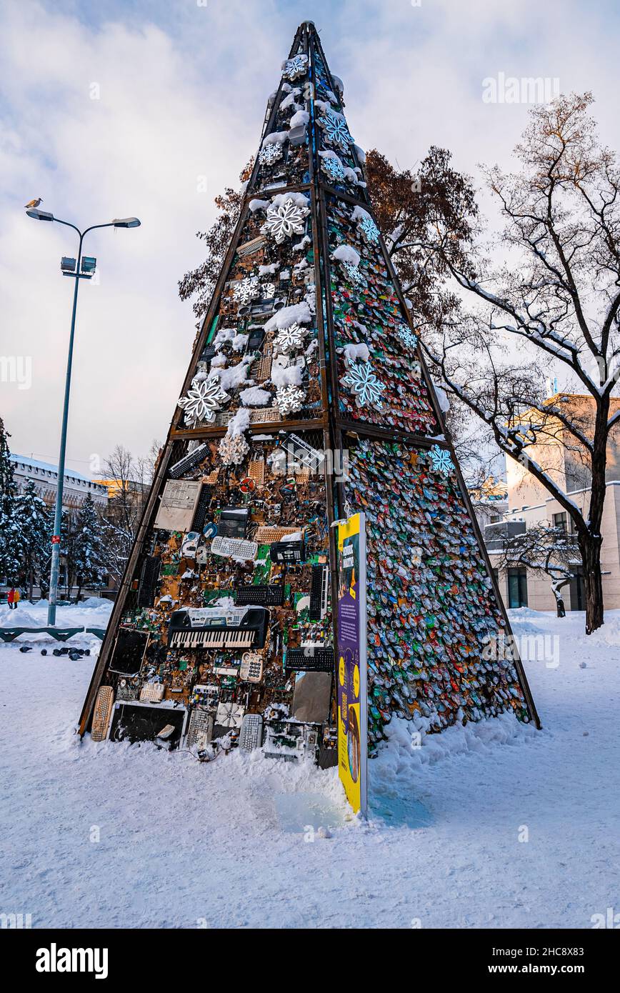 Eco Christmas tree made up of waste, recycled trash and used