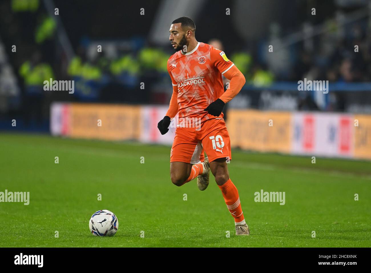 Keshi Anderson #10 of Blackpool makes a break with the ball in ,  on 12/26/2021. (Photo by Craig Thomas/News Images/Sipa USA) Stock Photo