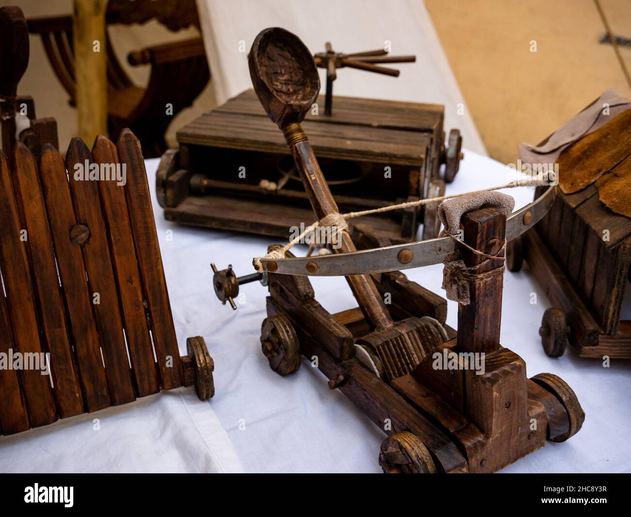 small wooden catapult model, miniature reproduction of medieval siege weapon Stock Photo
