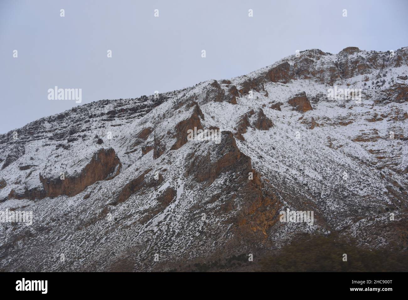 Panorama of a snow storm over the rugged red cliffs of the Utah desert wilderness. Stock Photo