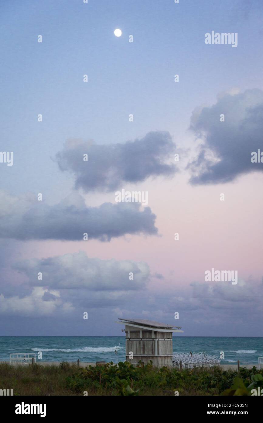 The moon above a hut on Miami Beach Stock Photo Alamy