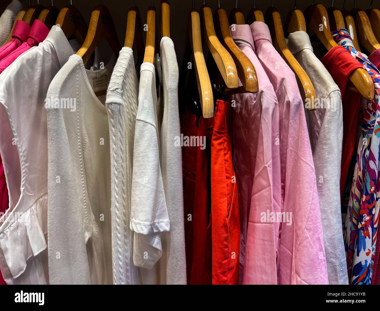 Clothes hanging on rack Stock Photo