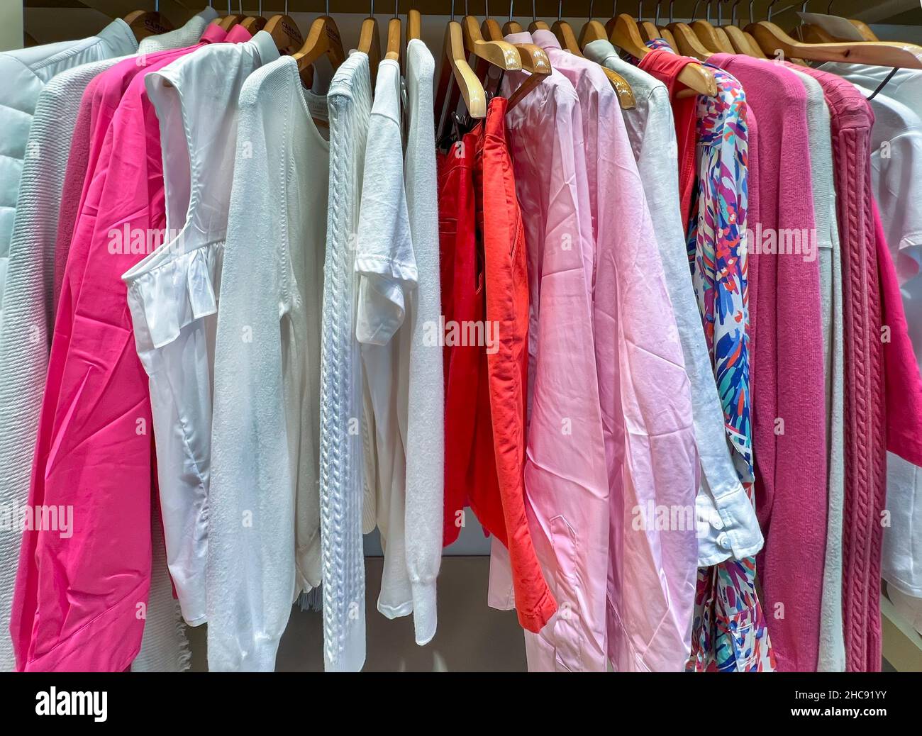 Clothes hanging on rack Stock Photo