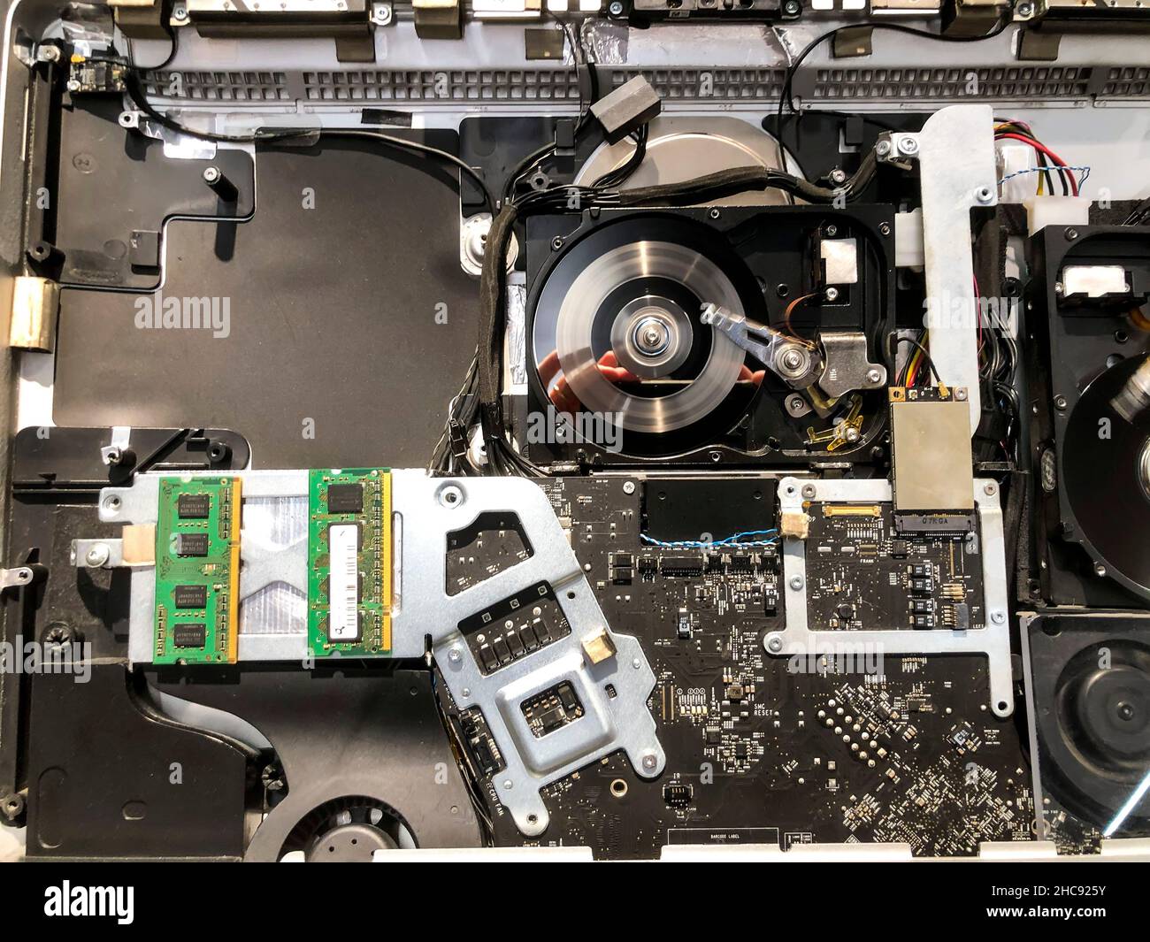 Hard drive and interior of computer Stock Photo
