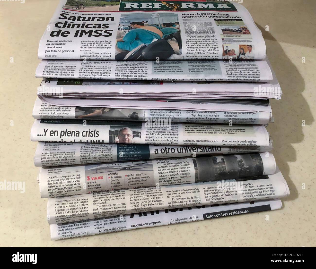 Pile of Spanish-language newspapers, Mexico Stock Photo