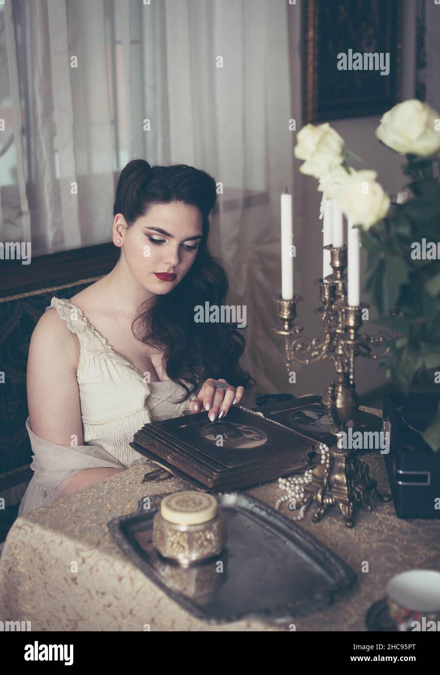 Vintage nostalgia woman old book hi-res stock photography and images ...