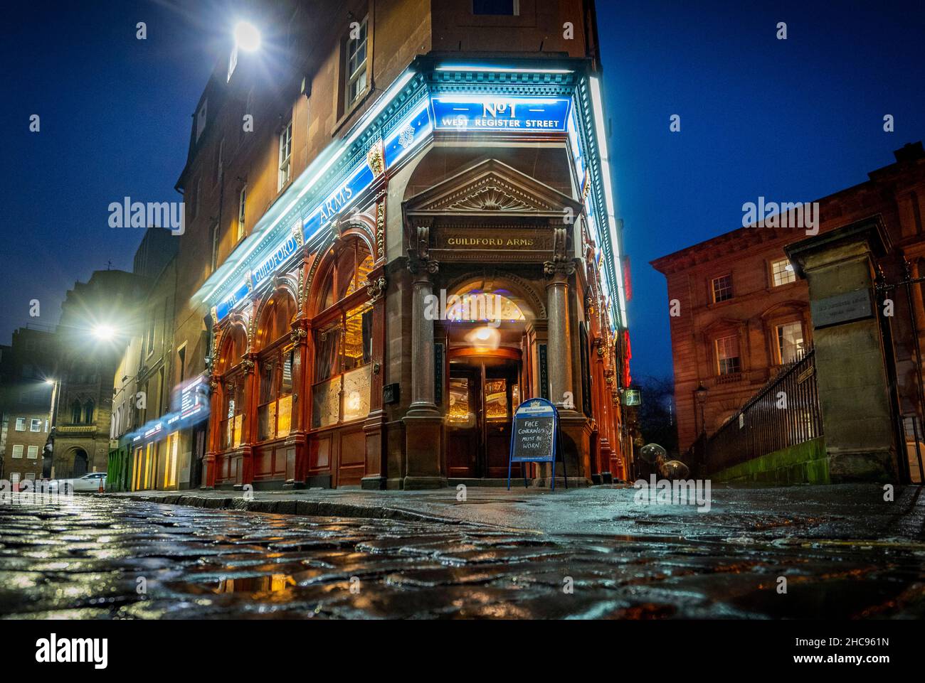 Night winter exterior view of The Guildford Arms pub in Edinburgh, Scotland, UK Stock Photo