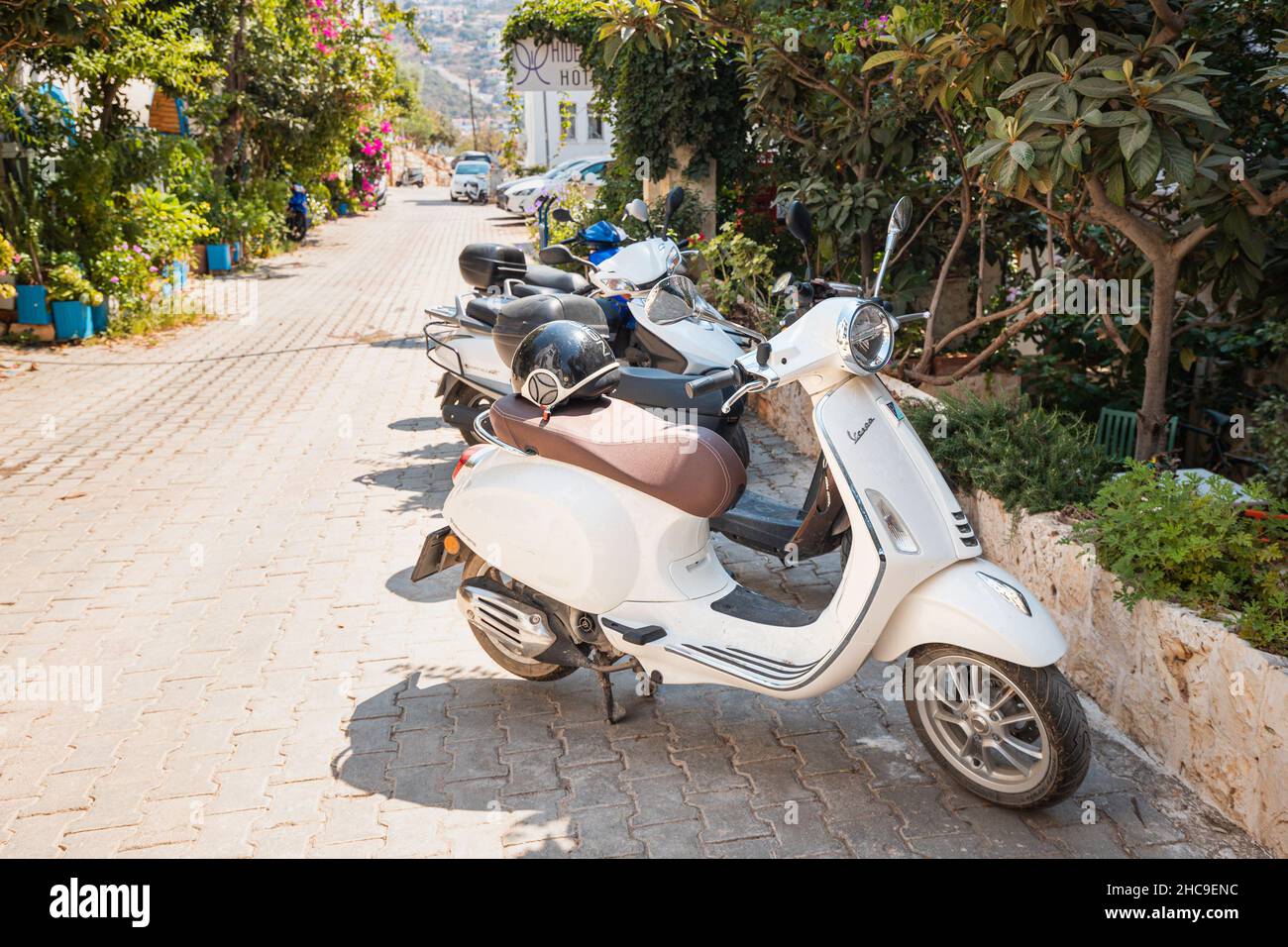 28 August 2021, Kas, Turkey; Vespa motorcycle scooter parked at city street Stock Photo
