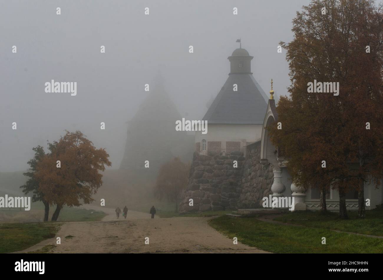 View of the Solovetsky Monastery in the fog. Fortress over water Stock Photo