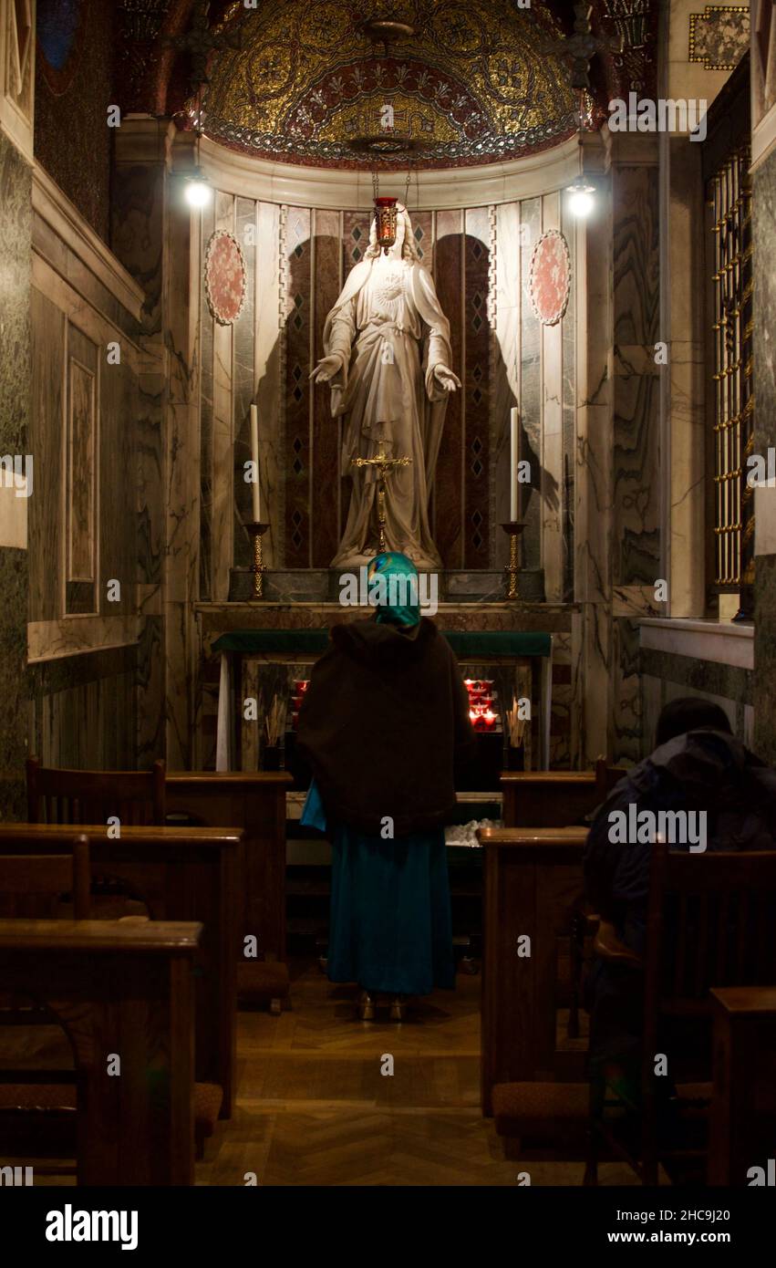 Prayers in Westminster Cathedral in London Stock Photo