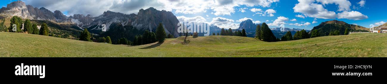 Hiking Dolomites in European Alps. Shot in summer with green grass and no snow. Gardena Pass, Italy Stock Photo