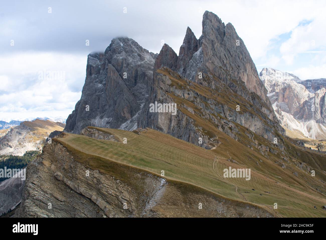 Hiking Dolomites in European Alps. Shot in summer with green grass and no snow. Gardena Pass, Italy Stock Photo