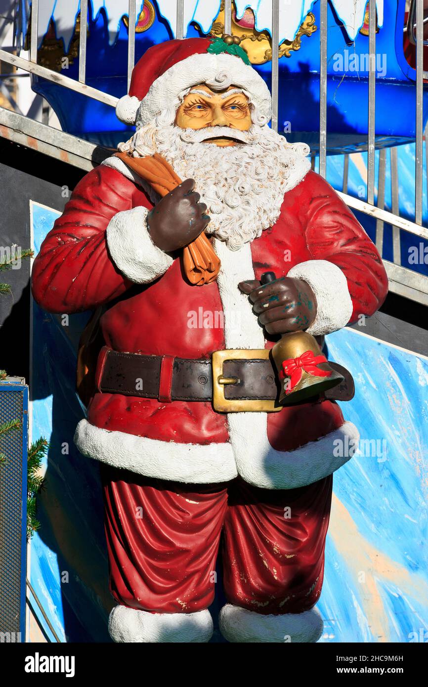 A wooden Santa Claus at the annual Christmas market at the Grand-Place in Lille (Nord), France Stock Photo