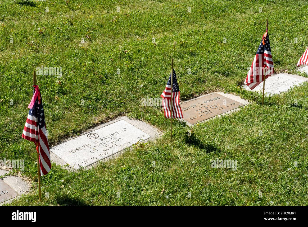 American flags decorate graves for the Memorial Day Holiday in the