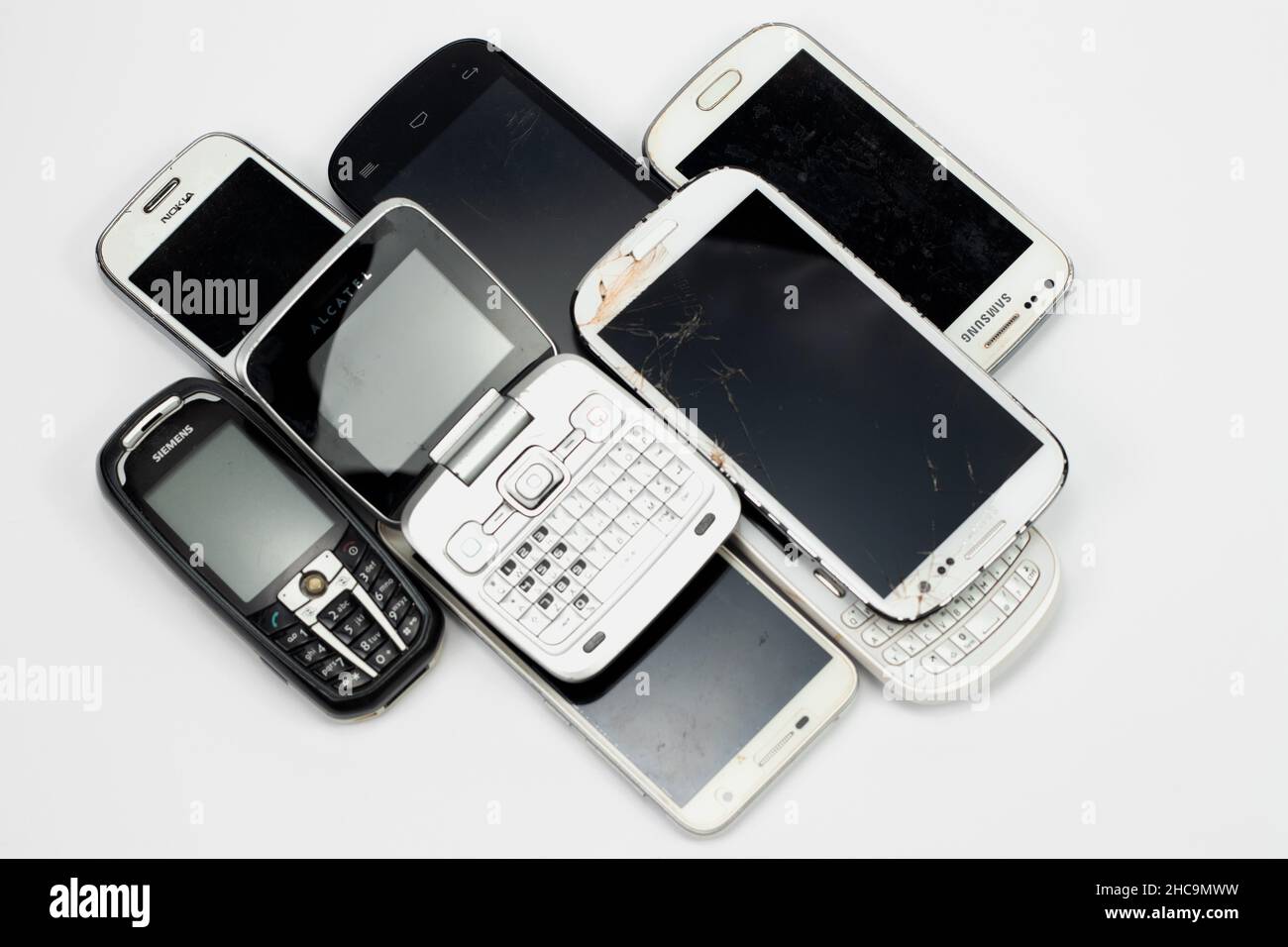 Old mobile phones isolated on a white background. Stock Photo
